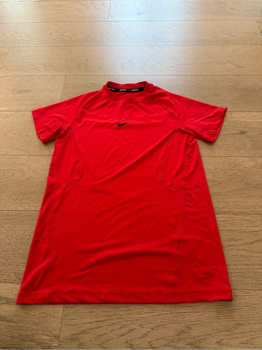 Nike Red Short Sleeve Kids Tee with Black Swoosh